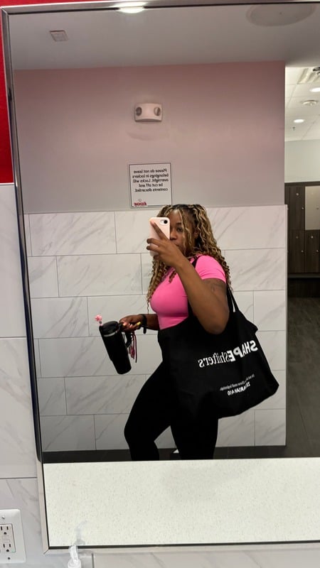 Coach Von carrying the Shapeshifters tote at the gym